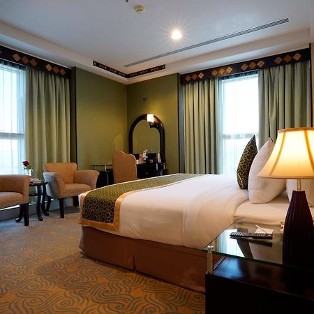 Awaliv International Hotel Ет-Таїф Номер фото A bedroom at the hotel