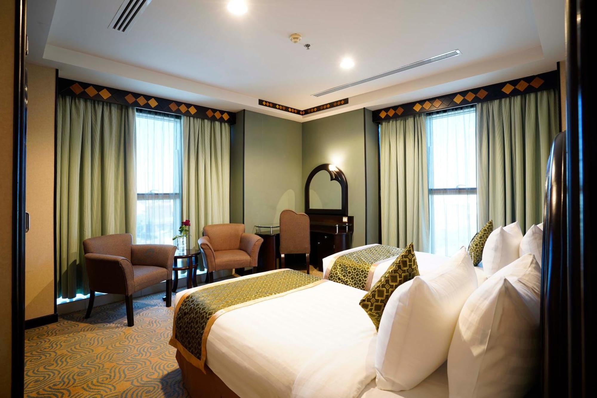 Awaliv International Hotel Ет-Таїф Номер фото A bedroom at the hotel