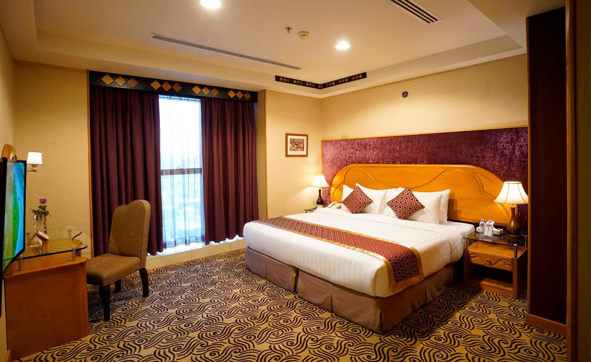 Awaliv International Hotel Ет-Таїф Номер фото A bedroom at the hotel