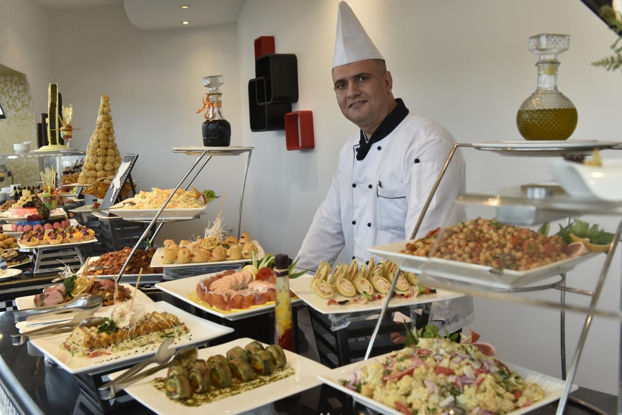 Awaliv International Hotel Ет-Таїф Екстер'єр фото A buffet at a hotel